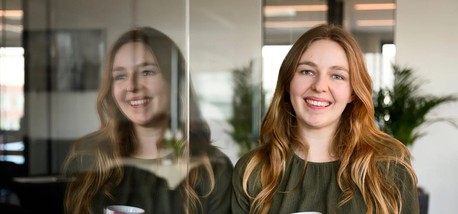 Female CIMSOLUTIONS colleague looking in the camera smiling